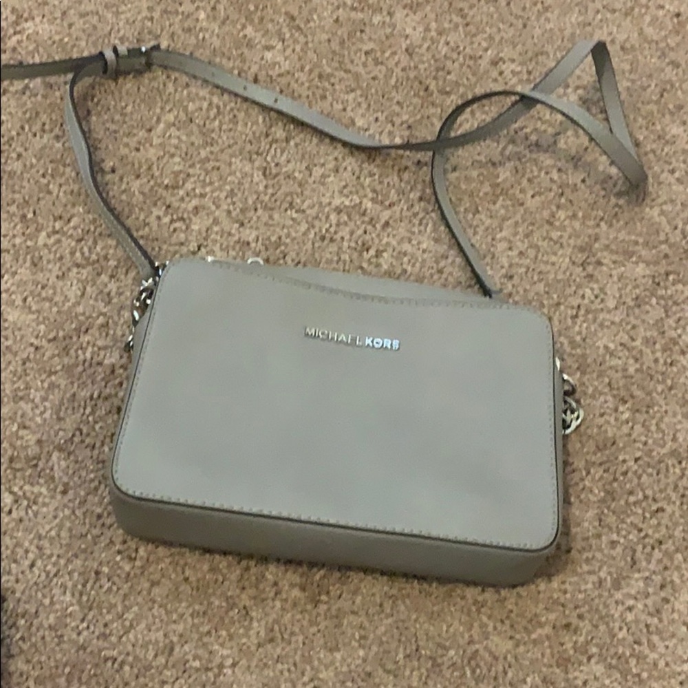 Gray and silver Michael kors crossbody
